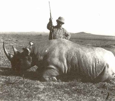Roosevelt pictured next to a massive Rhino taken with his Winchester .405 on an African safari