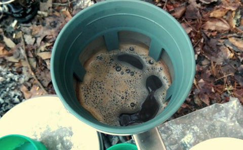 The French press has a rubber seal which prevents any coffee grounds from slipping past the press.