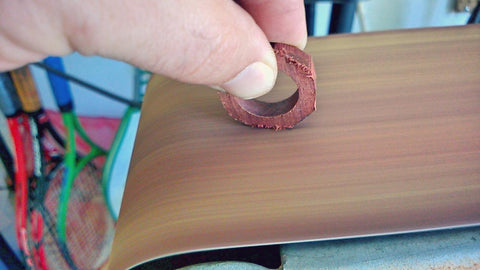 Eyeball the ring as it is being sanded to get it close to the line you drew.