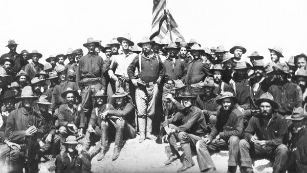 tr and his rough riders atop san juan hill