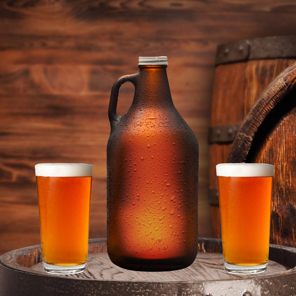 growler with two pints glasses sitting on whiskey barrel
