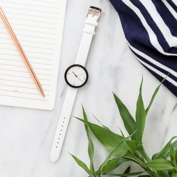 womens wood watch on marble slab