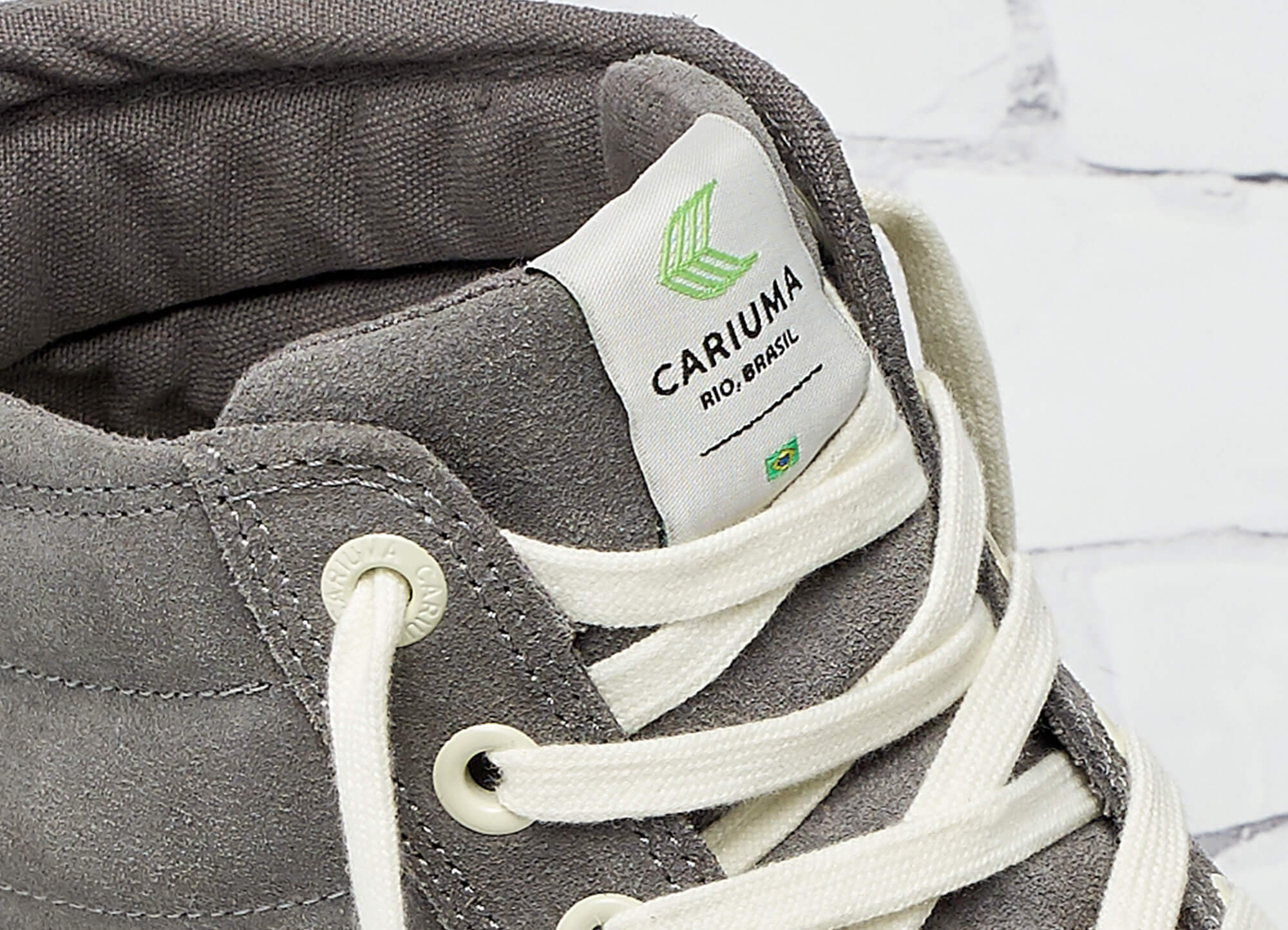 CARIUMA: Women's Stripe Charcoal Grey Suede Sneakers | OCA High