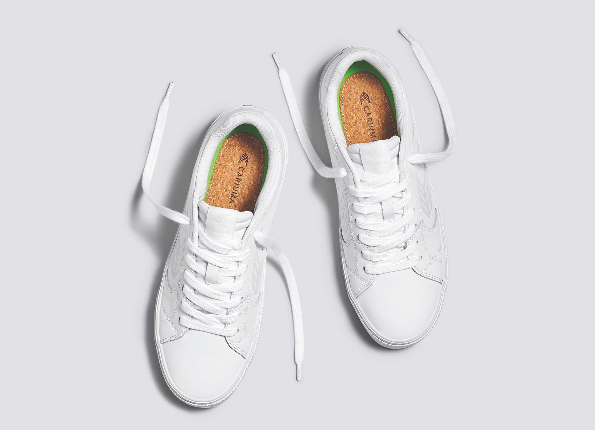 https://cdn.shopify.com/s/files/1/2495/5044/products/salvas-white-leather-sneaker.slideshow5.png?v=1676536554