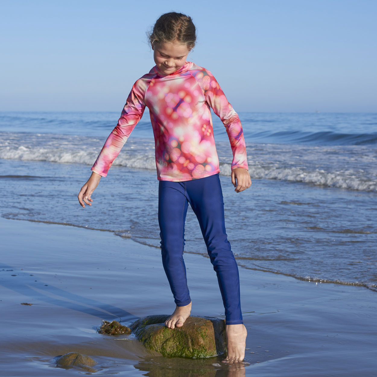 navy hybrid leggings upf50 girl testing ocean water temperature sunpoplife