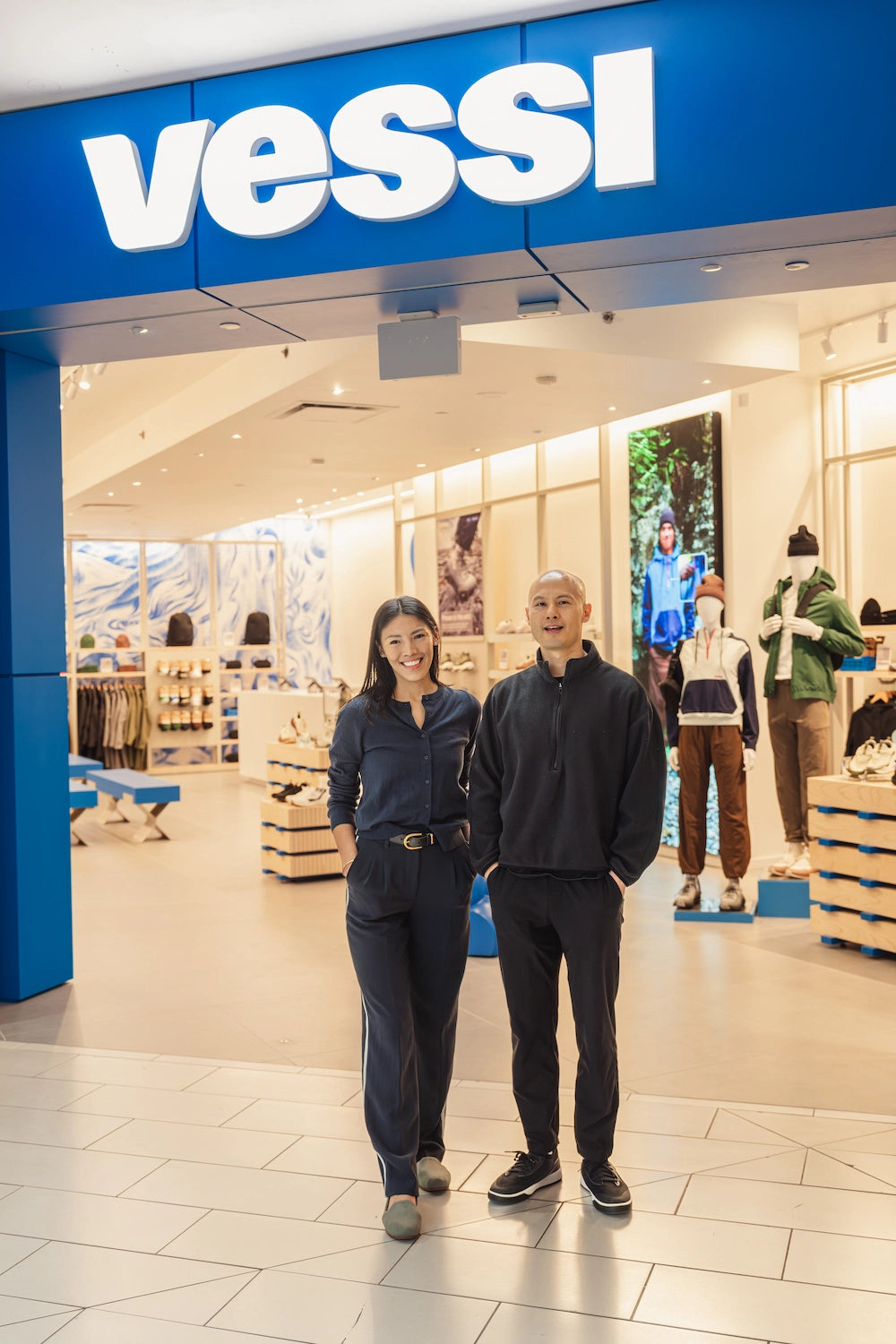 Vessi co-founders Andy Wang and Mikaella Go outside the refreshed Metrotown store in Vancouver, Canada.