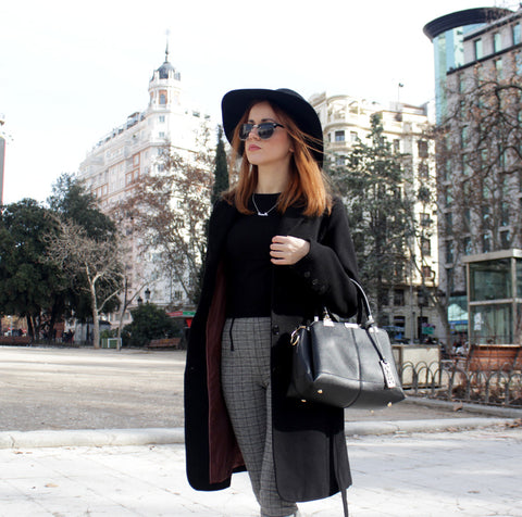 black coat and tote handbad