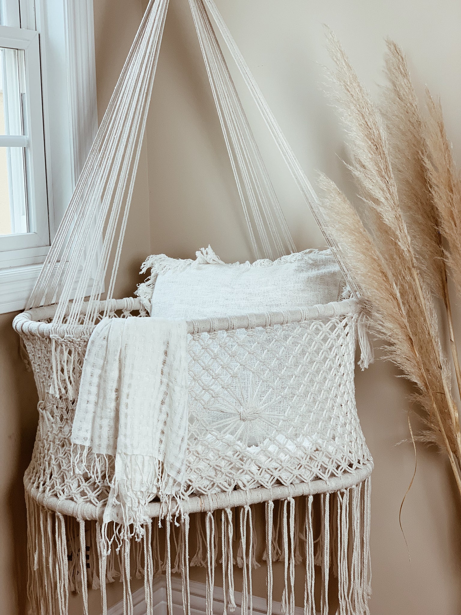 hanging macrame crib