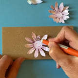 Shaping a die cut flower