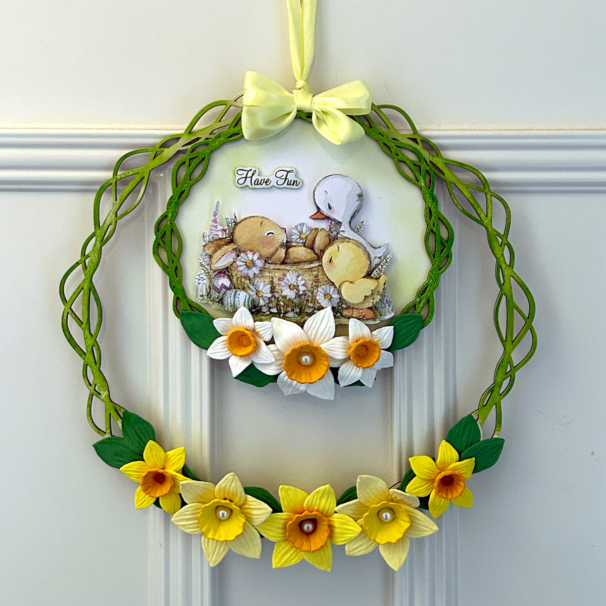daffodil-wreath-hanging-on-door.jpg__PID:7ca16605-531f-4e4e-a471-0a9979b1f3d0