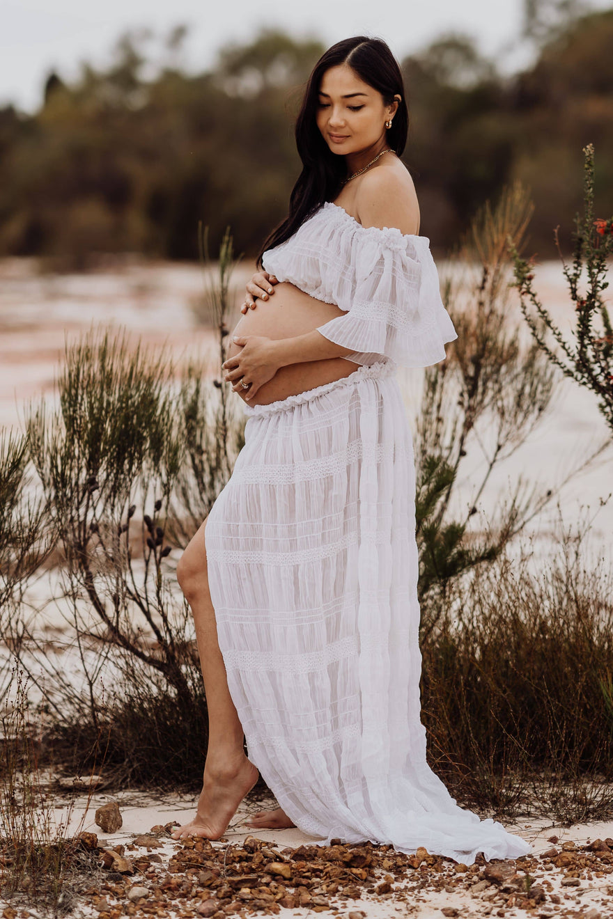 https://cdn.shopify.com/s/files/1/2502/6250/files/Mama-Rentals-White-Lotus-Tulle-Maxi-Two-Piece-Set-5_880x.jpg?v=1700020630