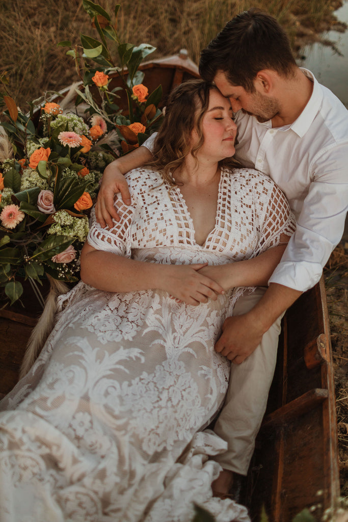 A beautiful non-pregnant lady wears Mama Rentals' Reclamation 'Bewitched by Boho' gown in Ivory colour at her elopement shoot.