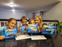 Kids with packs of Oreo Cookies {Daisy May & Me}