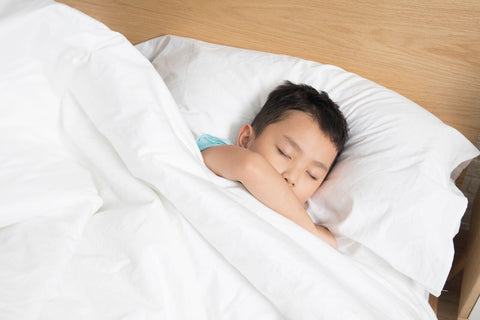 Child sleeping in mattress with Luxury Hotel Sheet