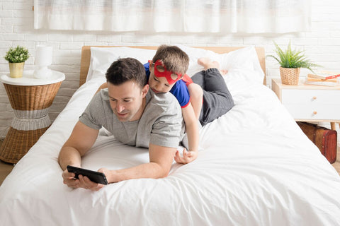 father-and-son-in-bed