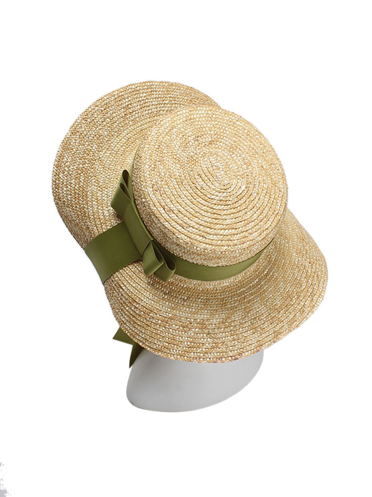 straw hat with green ribbon