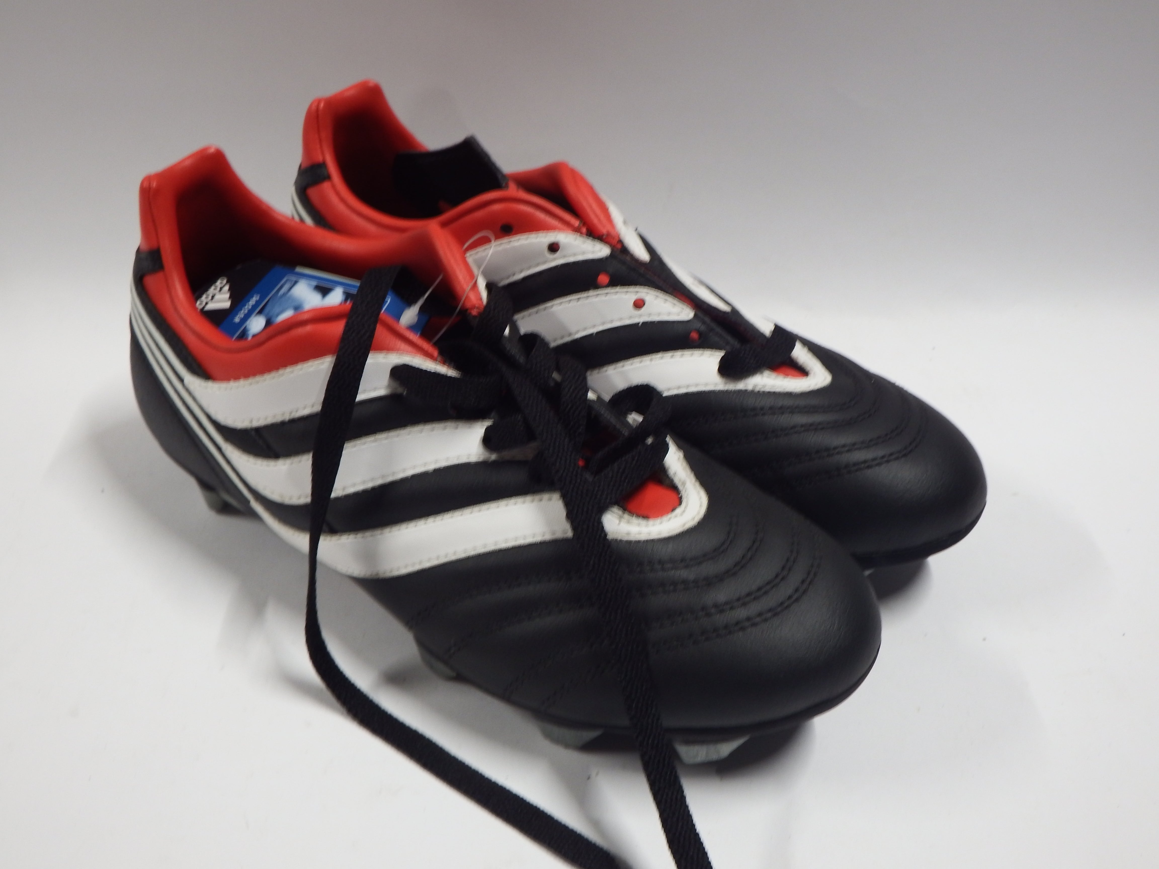 black and red predator football boots