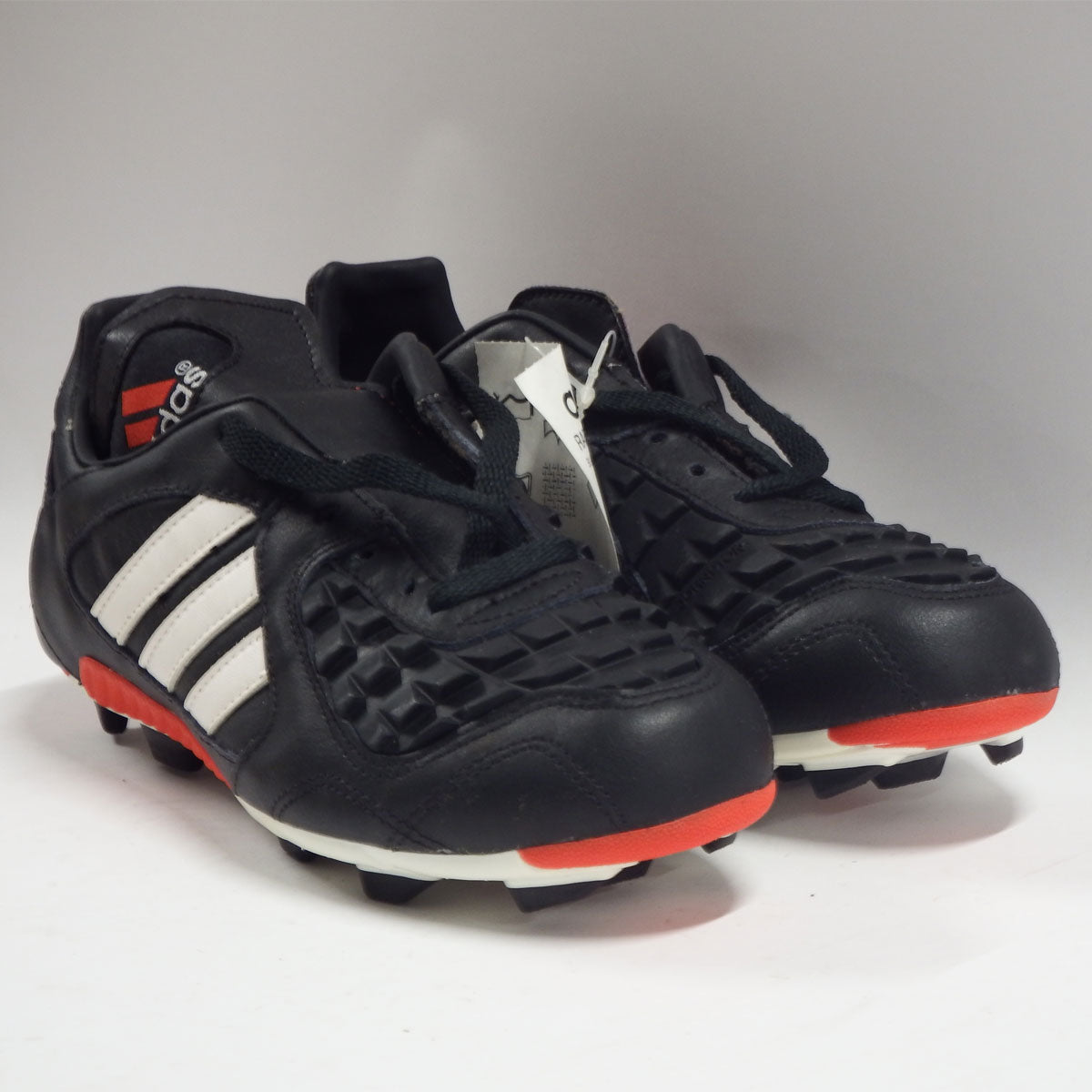 black and red predator football boots