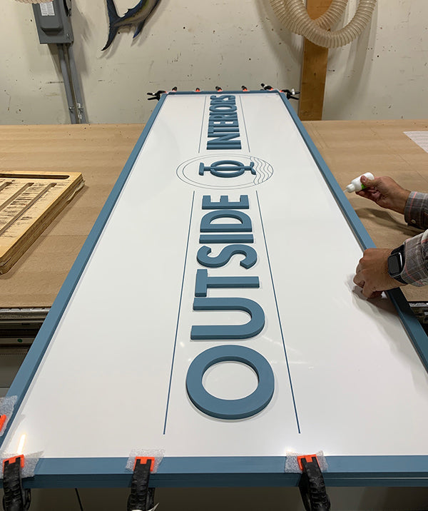 outside interiors custom sign made in ocean city maryland