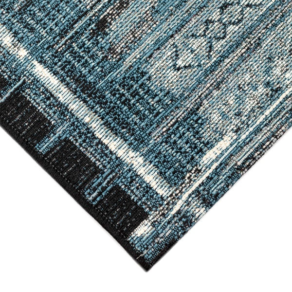 blue textured outdoor rug