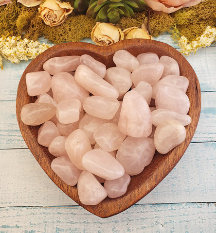 Rose quartz in heart-shaped bowl