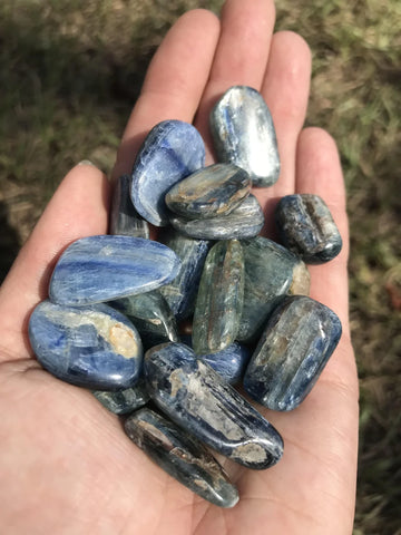 Tumbled Kyanite Stones in Hand