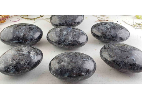 Image of a set of larvikite palm stones