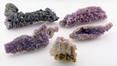 Grape agate cluster on white background