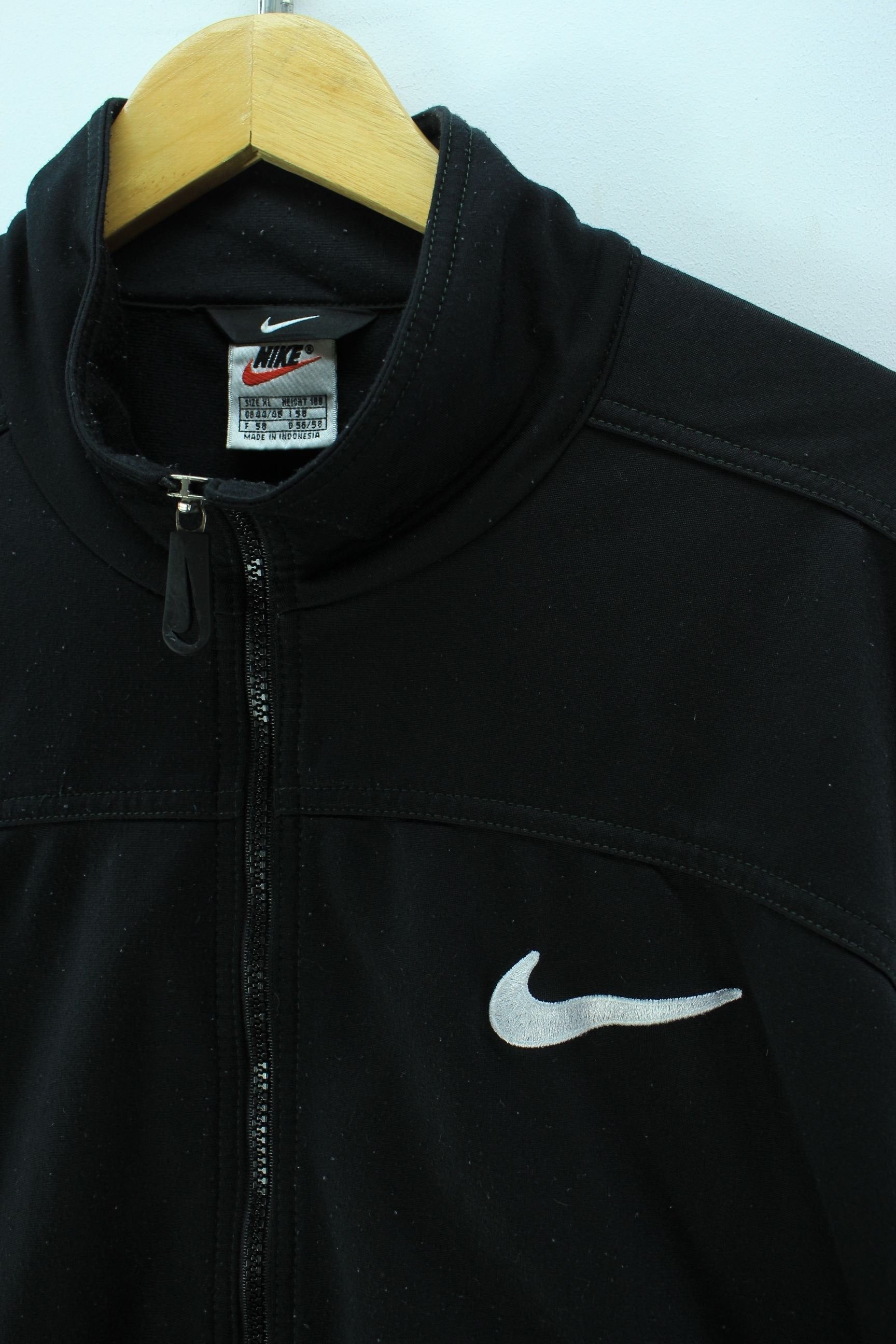 nike zip track top