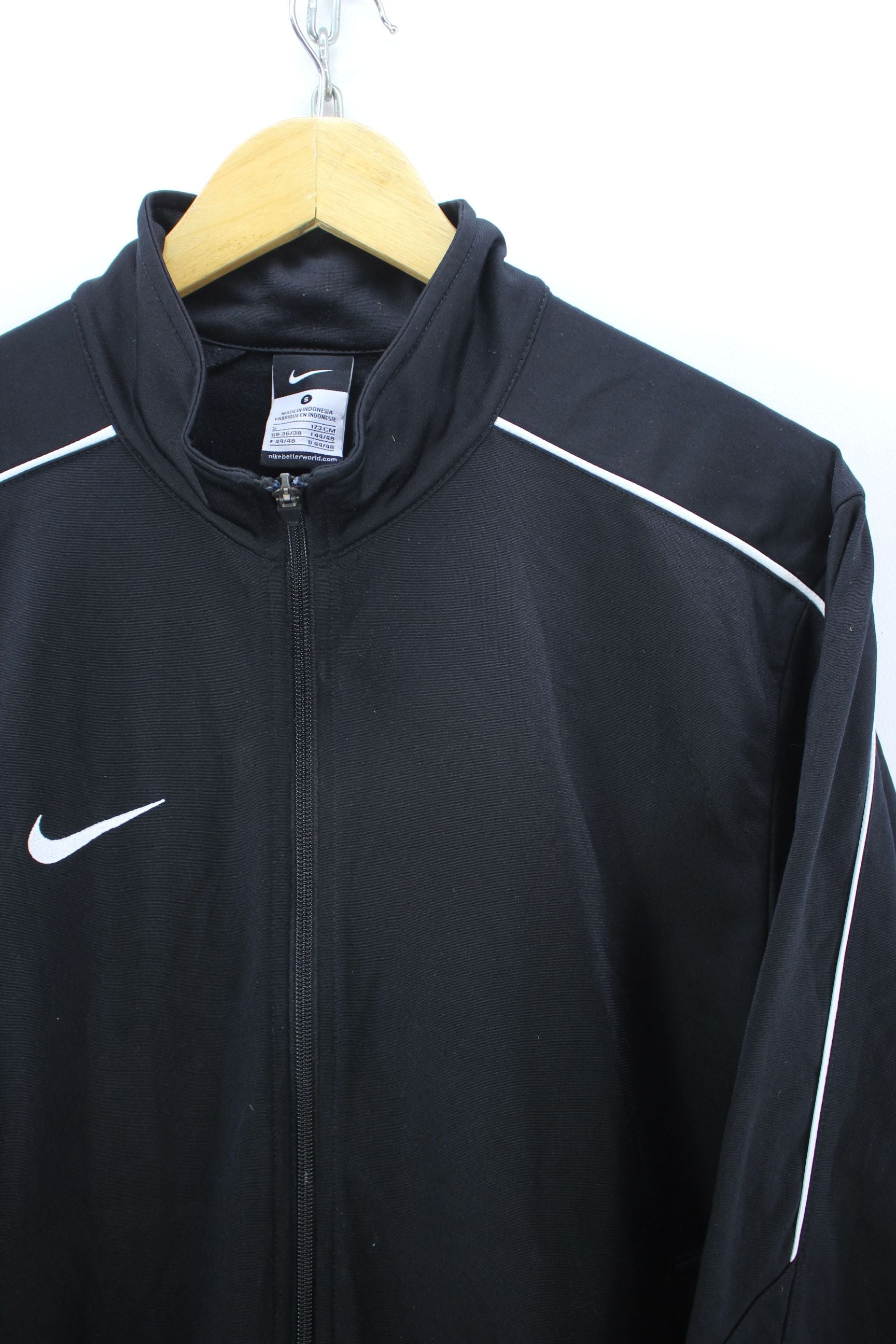 black nike track top