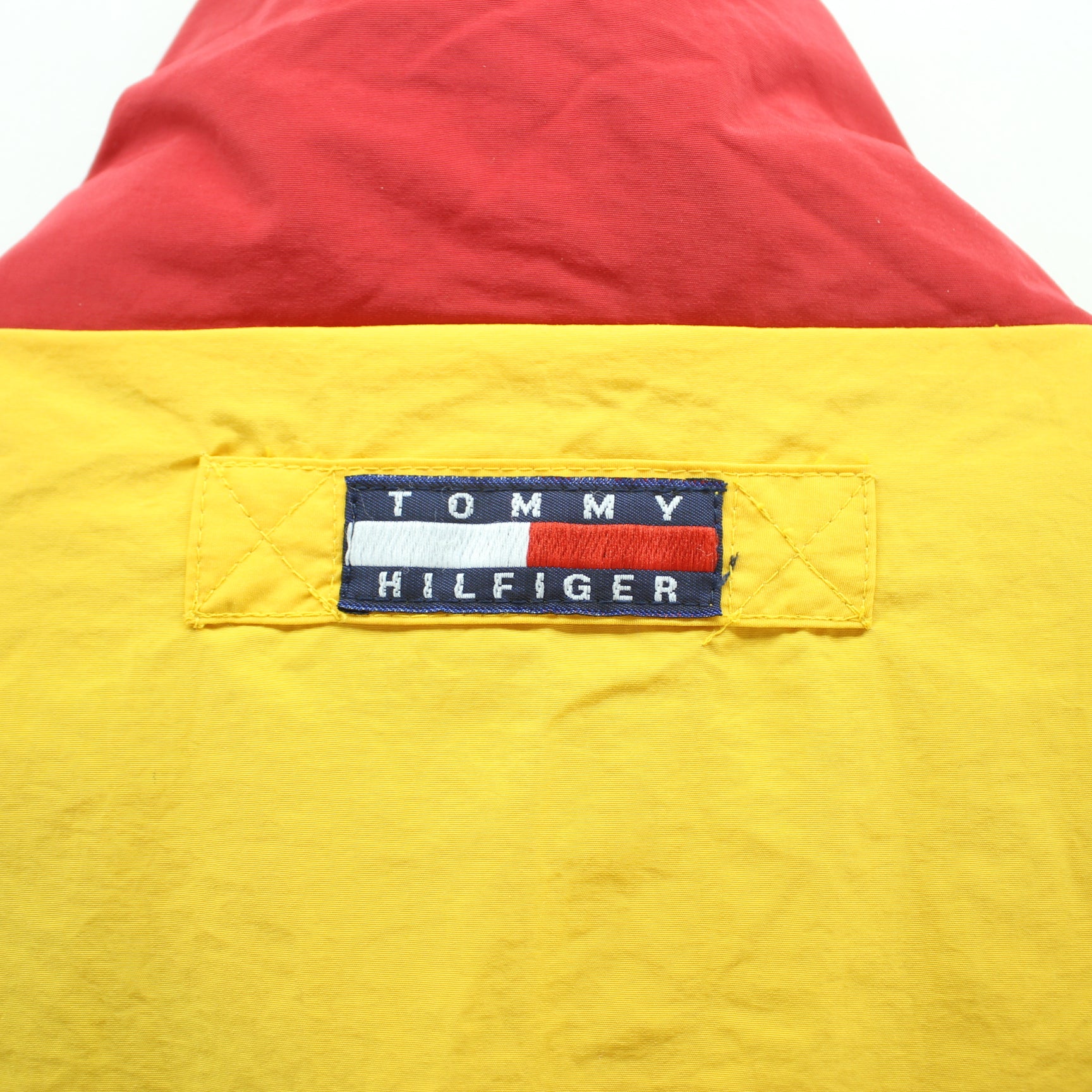 yellow and blue tommy hilfiger windbreaker