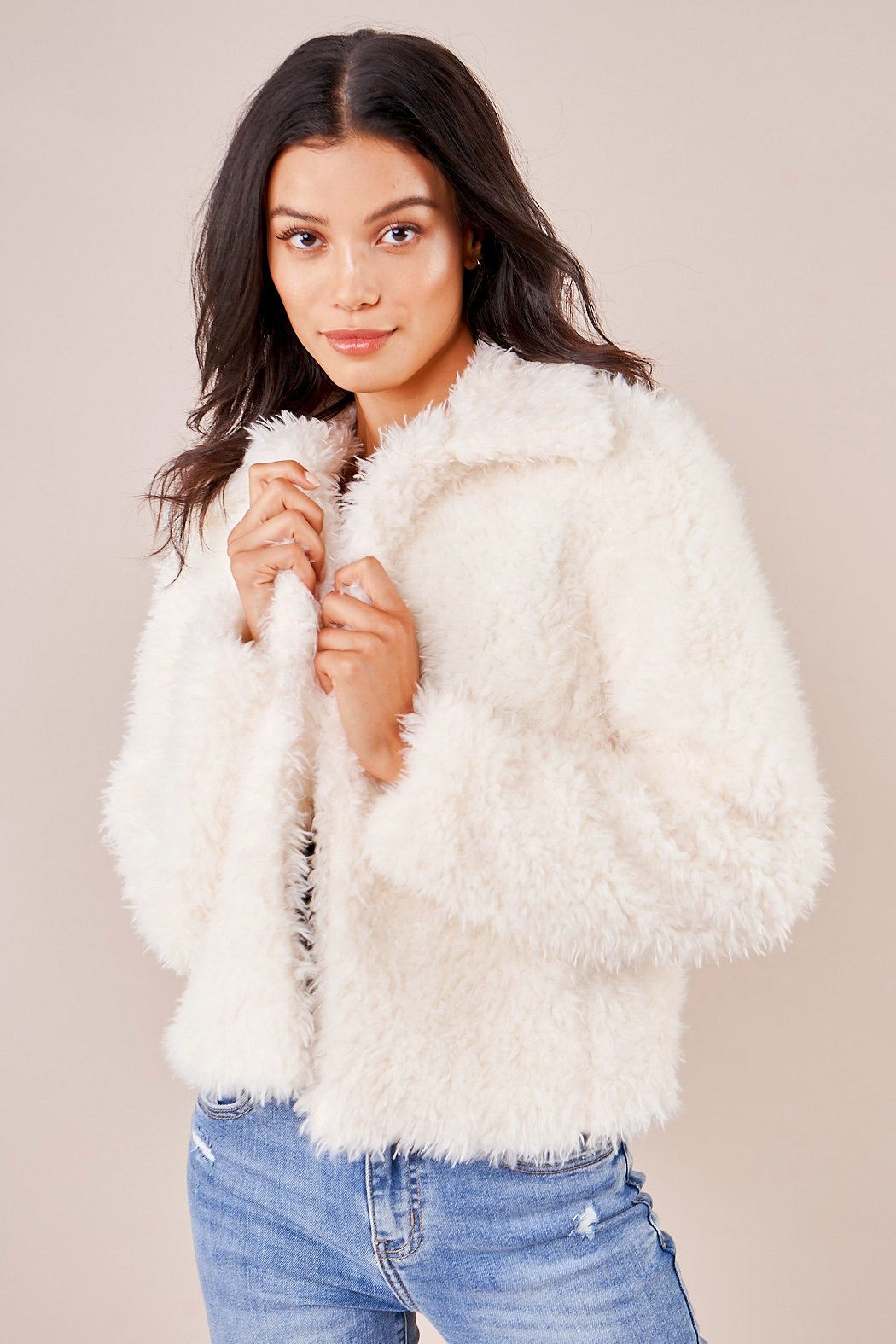 white faux fur jacket