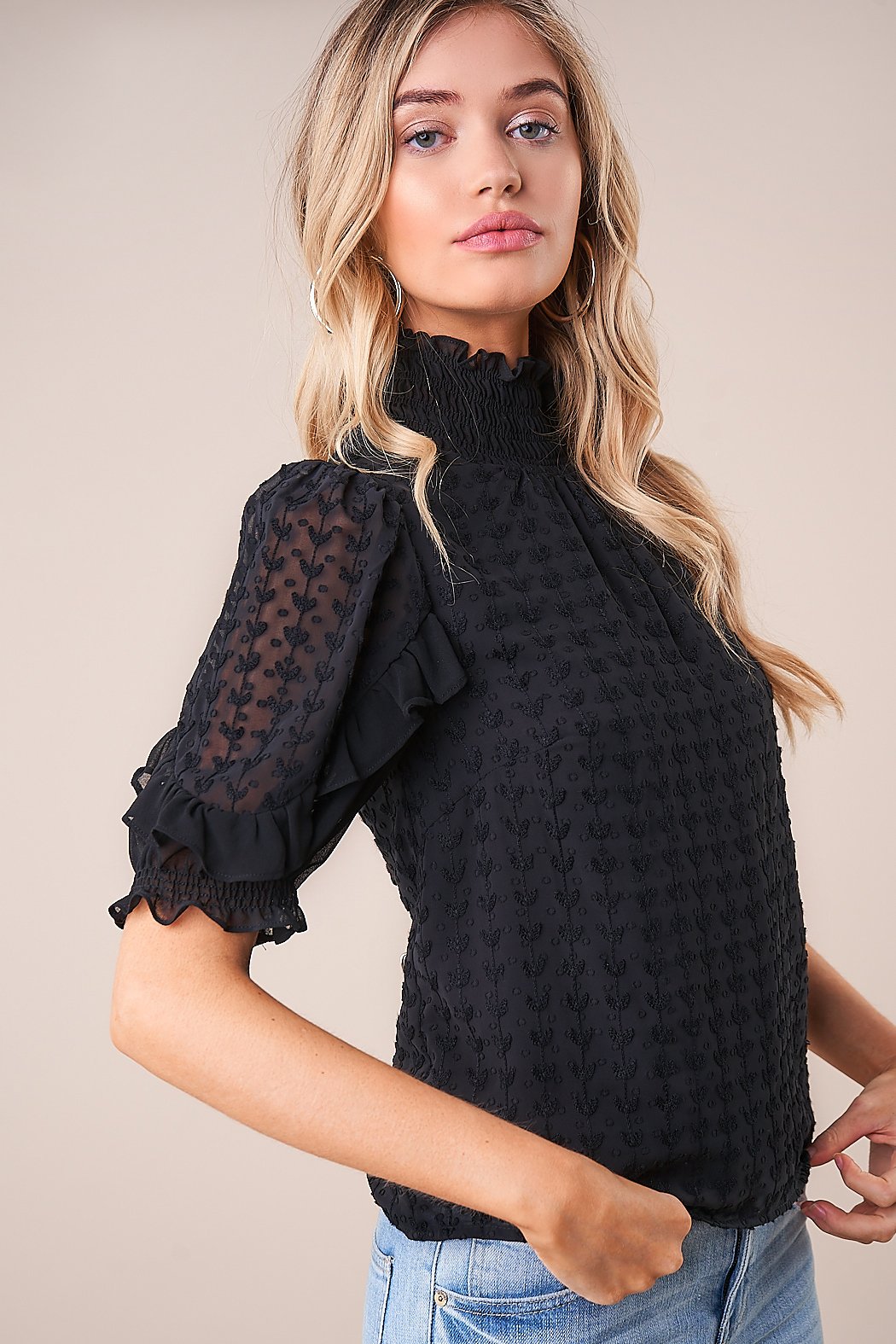 smocked mock neck blouse