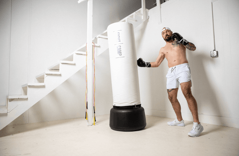 Aaron Swenson Punching on a Punching Bag