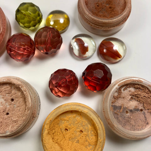 pots of natural terracotta makeup shades