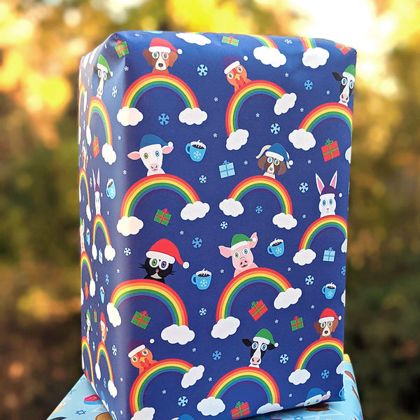 Rectangle gift box wrapped in Rainbow Friends Holiday Animal Wrapping Paper