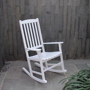 white wooden rocking chairs