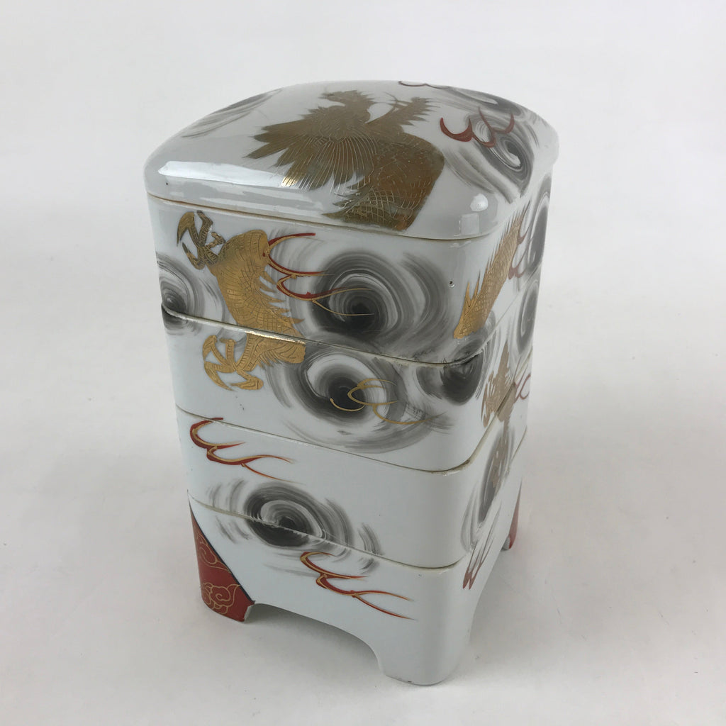https://cdn.shopify.com/s/files/1/2511/7796/files/Antique-C1900-Japanese-Porcelain-Lidded-4-tiered-Bento-Box-Jubako-Dragon-PY561_1024x.jpg?v=1698090935