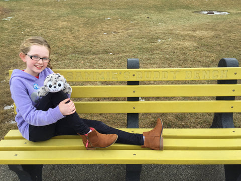 Shore Buddies Ocean Hero of the Week: Sammie Vance on her bench with Sammy the Seal.jpg