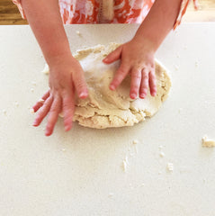 Child kneading playdough