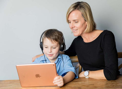 Mother doing a hearing test with her child