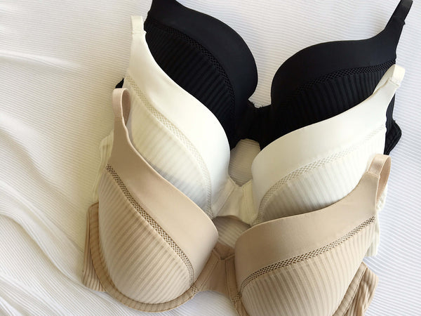 3 bras in white, neutral and black