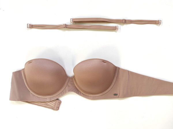 The memories strapless bra laid out on a white background with straps detatched