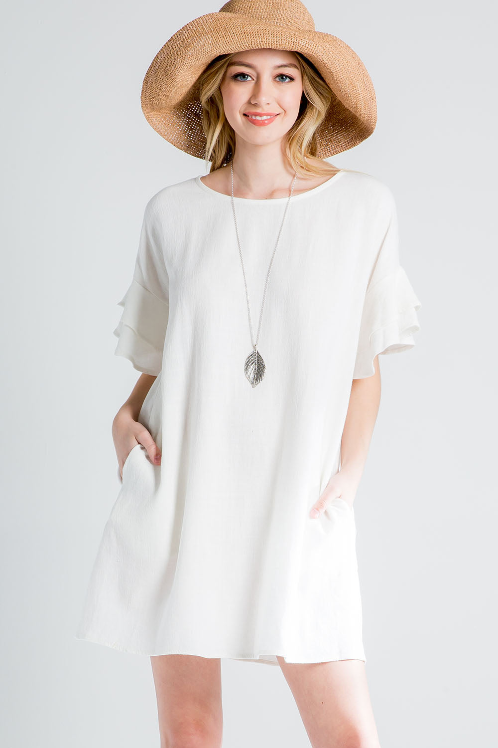 white linen dress with pockets