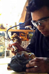 Joaquin Lopez Lopez carving Chiapas amber into a masterpiece!