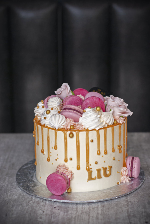 Megs Food Poetry - 🖤 50th Birthday Cake⭐ Rose gold, pink and white themed  cake. Decorated with macarons, sprinkles, piping, rose gold drip, stars and  candle. 20cm Vanilla cake- layers of red