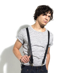 Elastic suspenders on solid white t-shirt