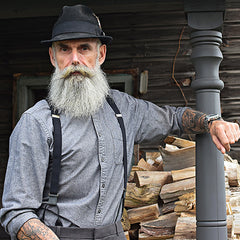 bearded-man-wearing-hat-and-elastic-wiseguy-suspenders