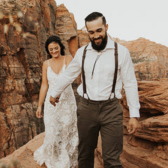 bride-and-groomsmen-in-mountains-wearing-wiseguy-suspenders
