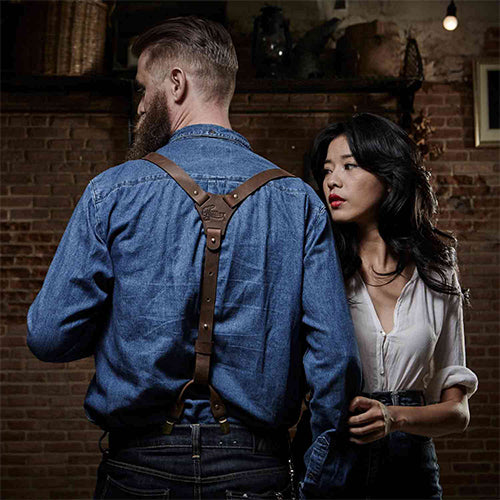 Woman and a man wearing denim and leather Wiseguy Suspenders